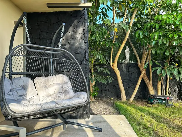 Hanging double egg chair in the garden