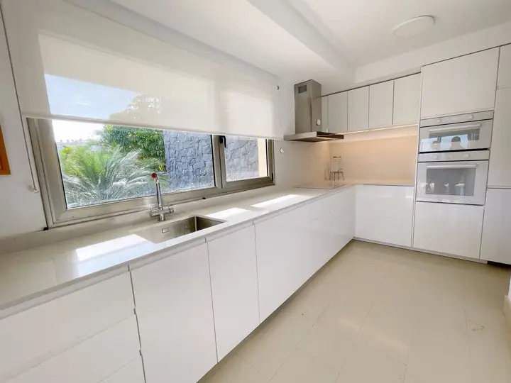 White fully equipped kitchen